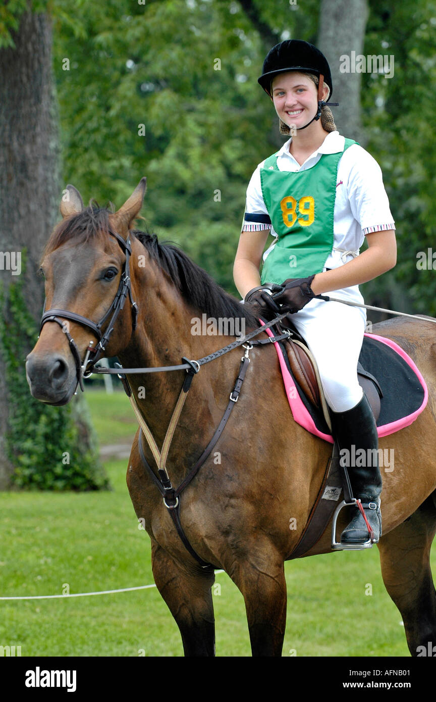 Portrait of a female contestant with her horse at an Equestrian event