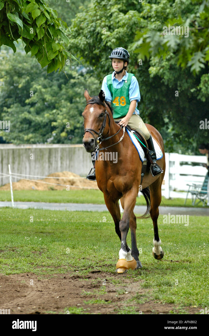 Portrait of a female contestant with her horse at an Equestrian event