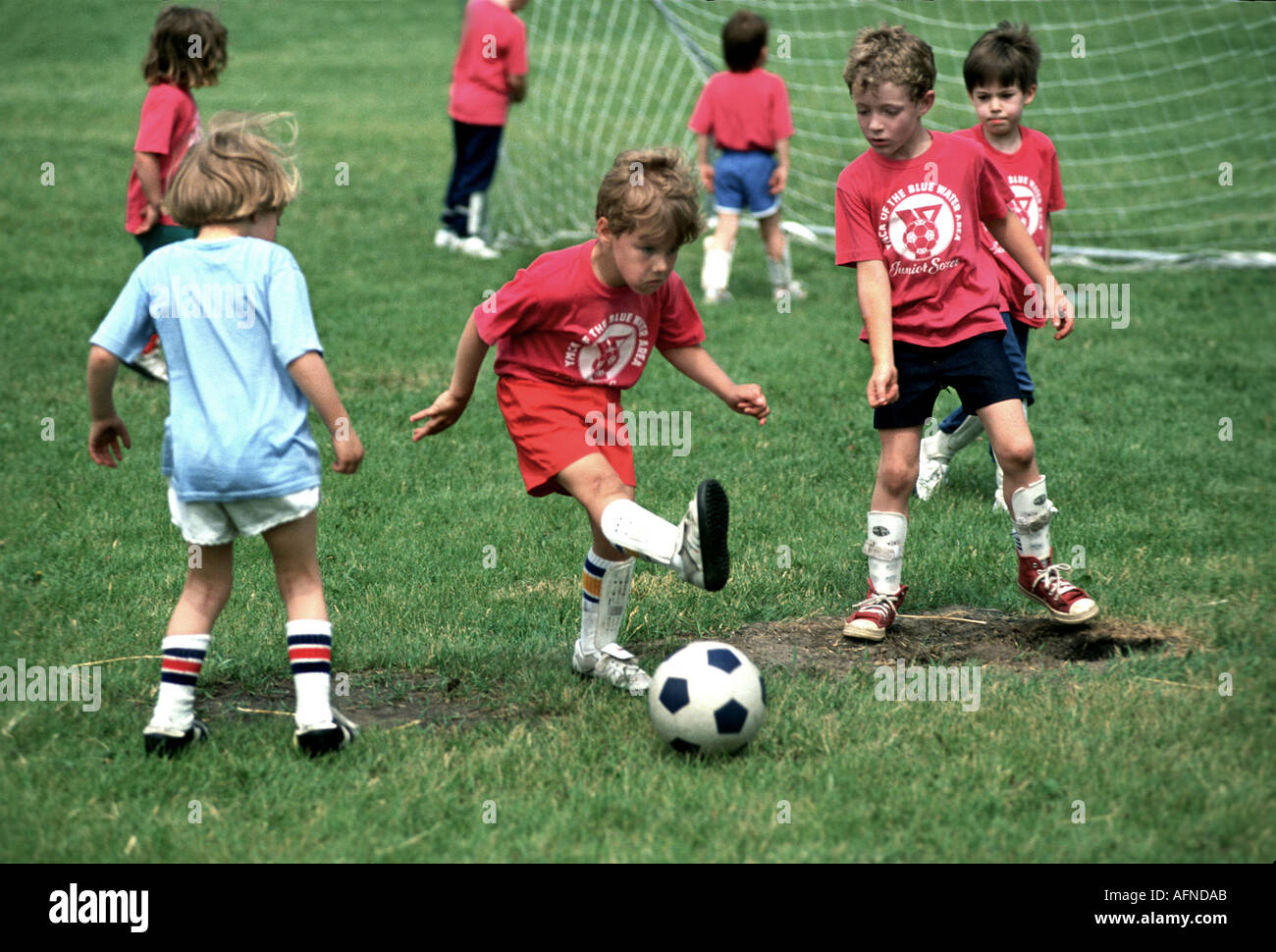 5 and 6 boy and girl soccer futbol football action Port Huron Michigan Stock Photo