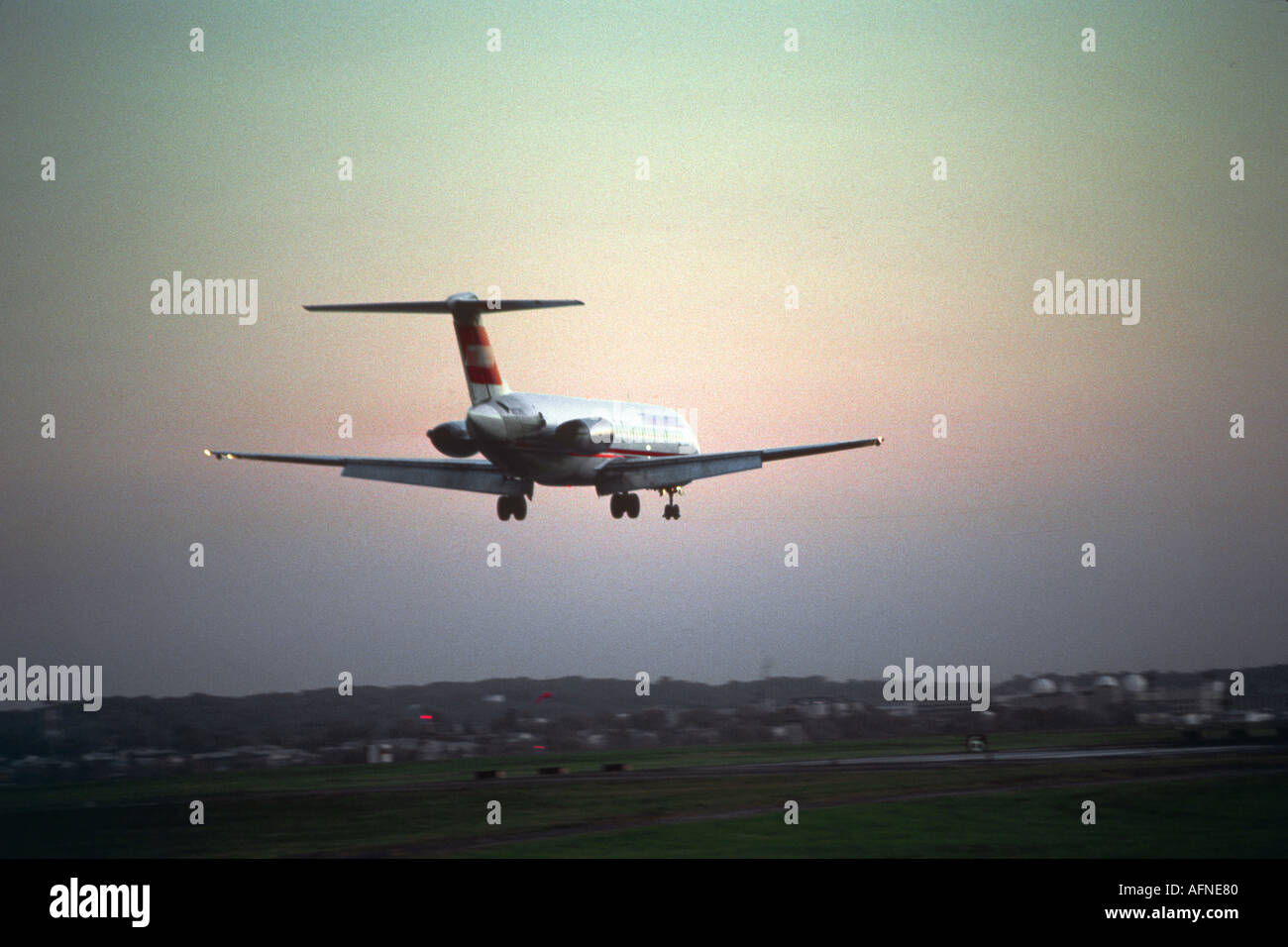 Jet aircraft airplane lands and Sarasota Florida airport Stock Photo