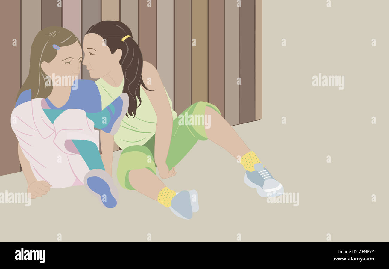 Two girls whispering Stock Photo - Alamy