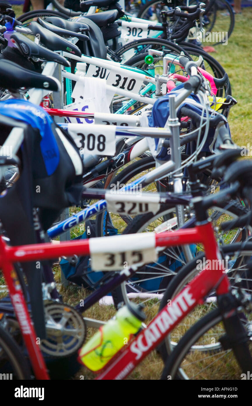 Racks of bicycles at a triathlon Stock Photo - Alamy