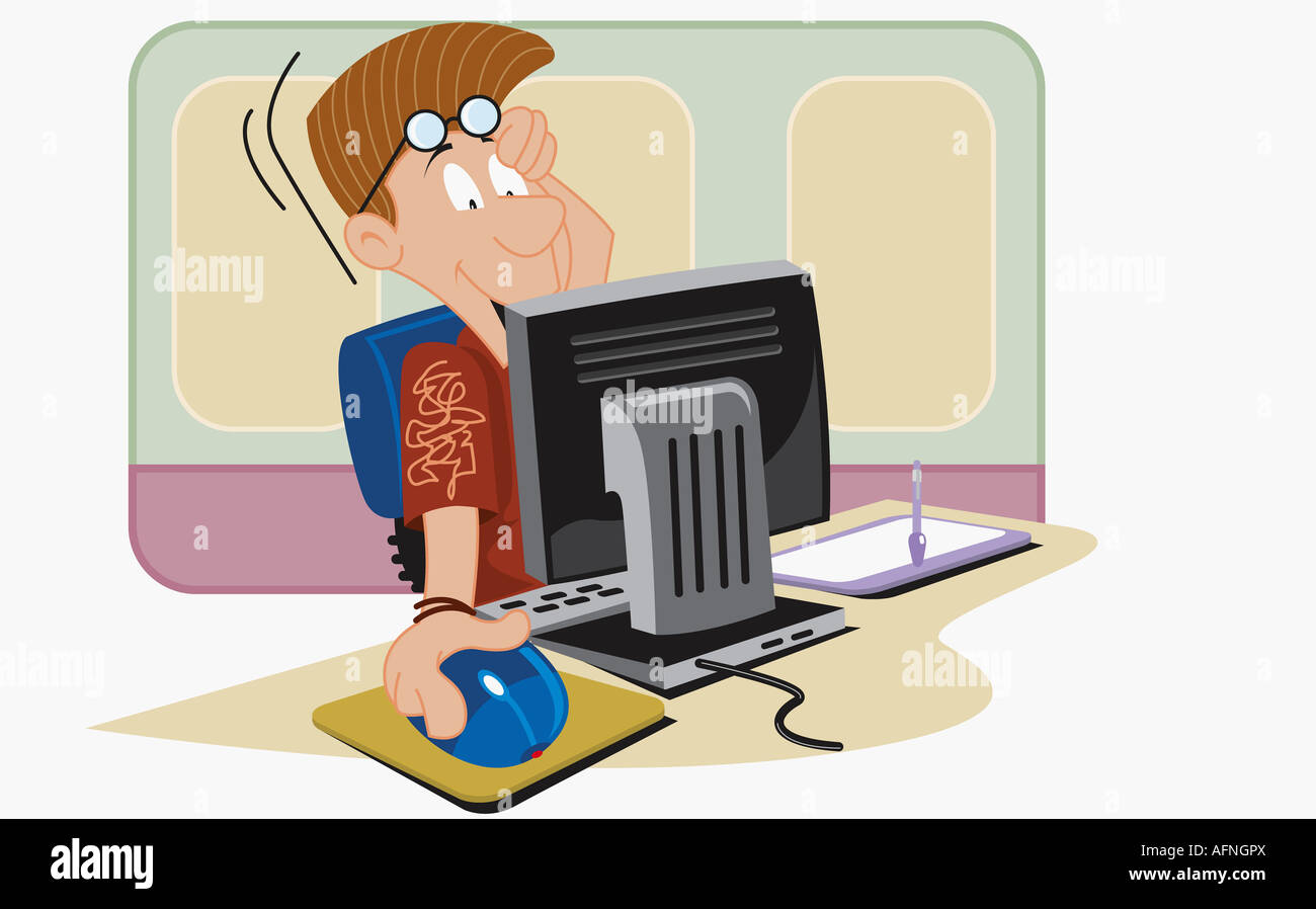 Young man using a computer Stock Photo - Alamy