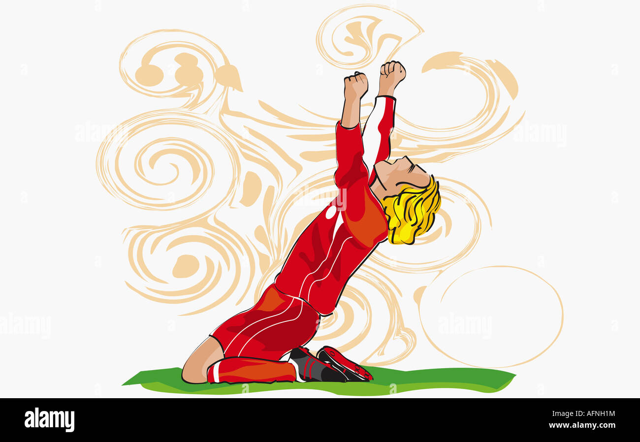Soccer player kneeling with his arms raised Stock Photo Alamy
