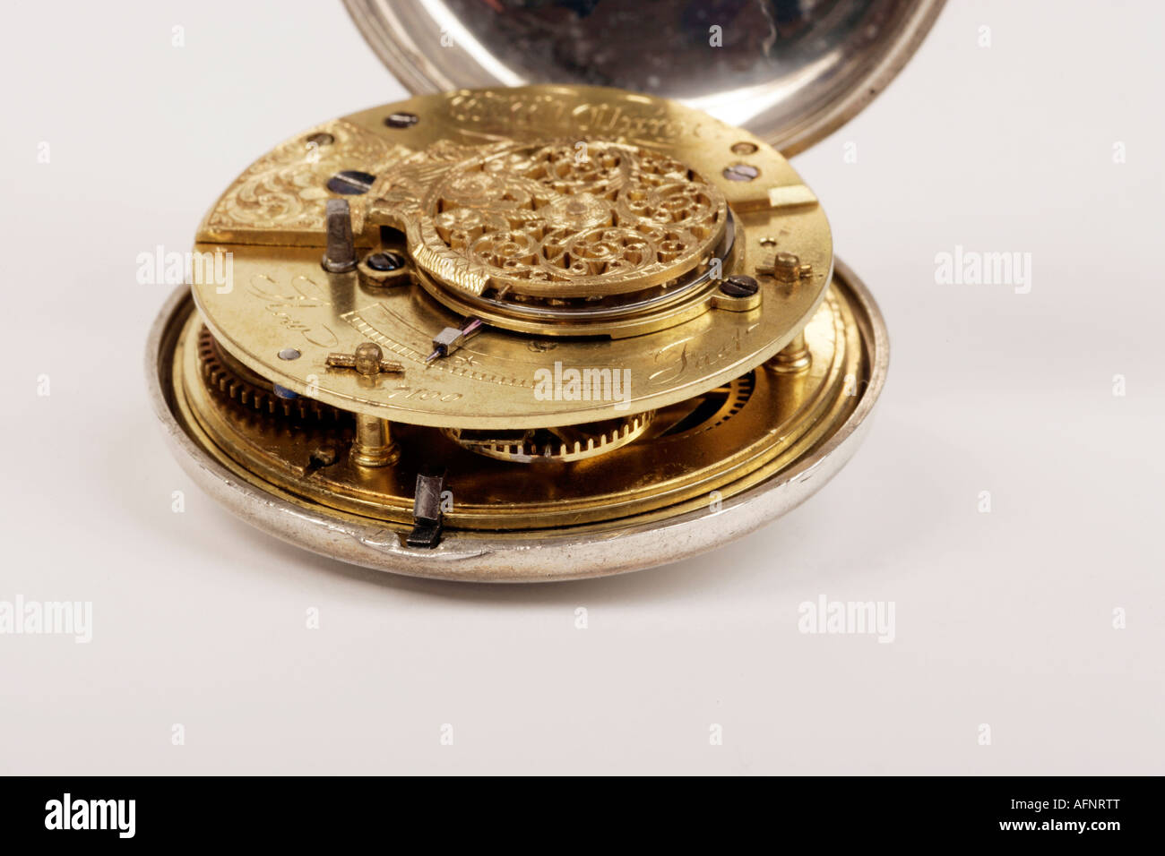 silver pair cased half hunter pocket watch showing the internal