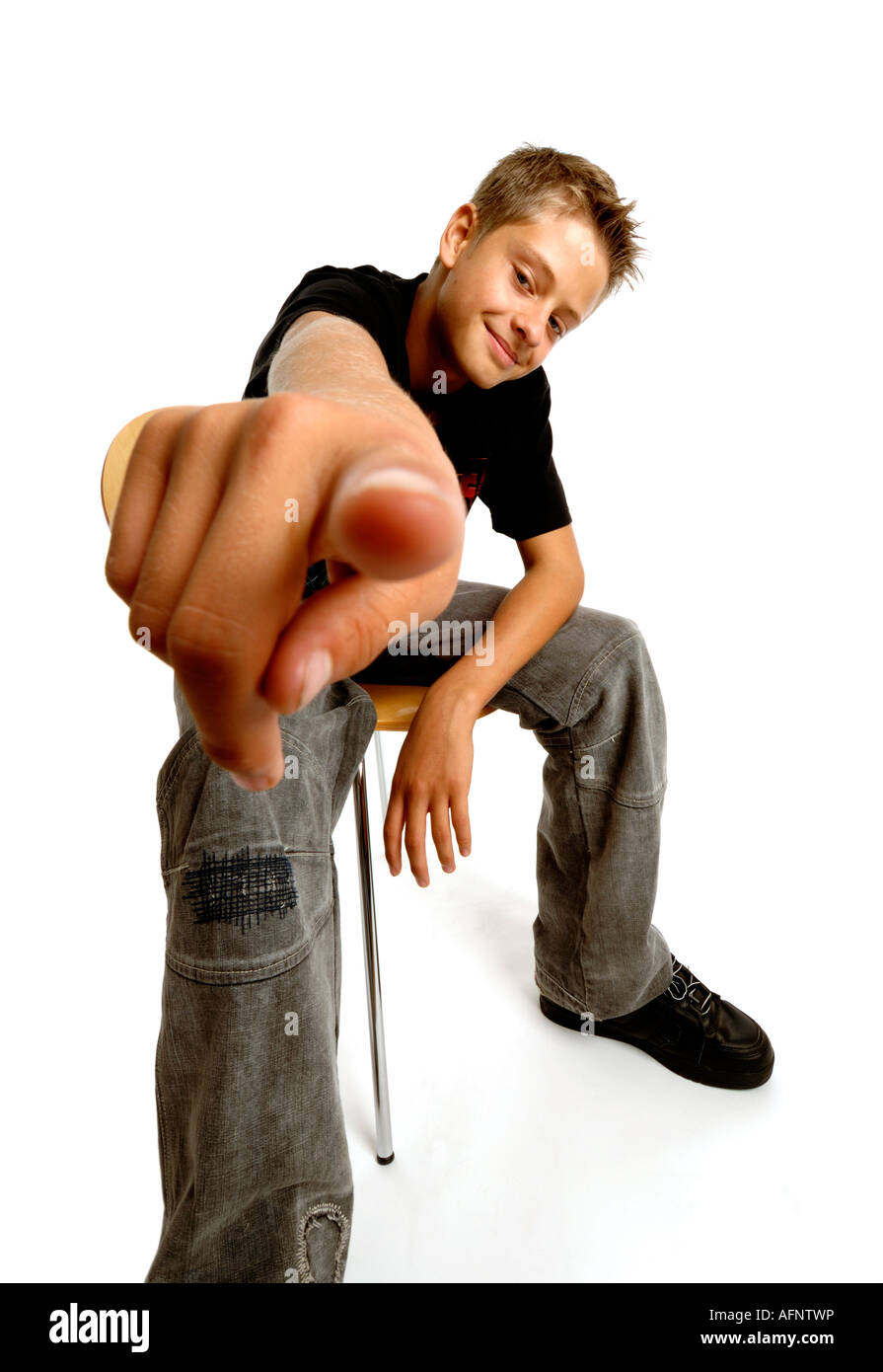 Boy pointing to camera Stock Photo