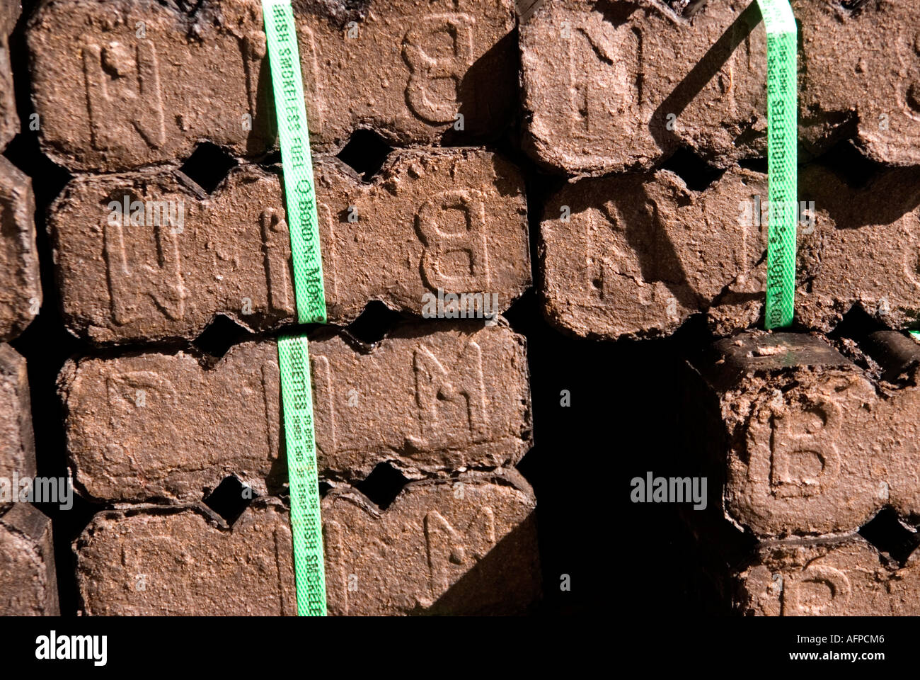 Peat blocks ready for the fire in Broughshane County Antrim Stock Photo