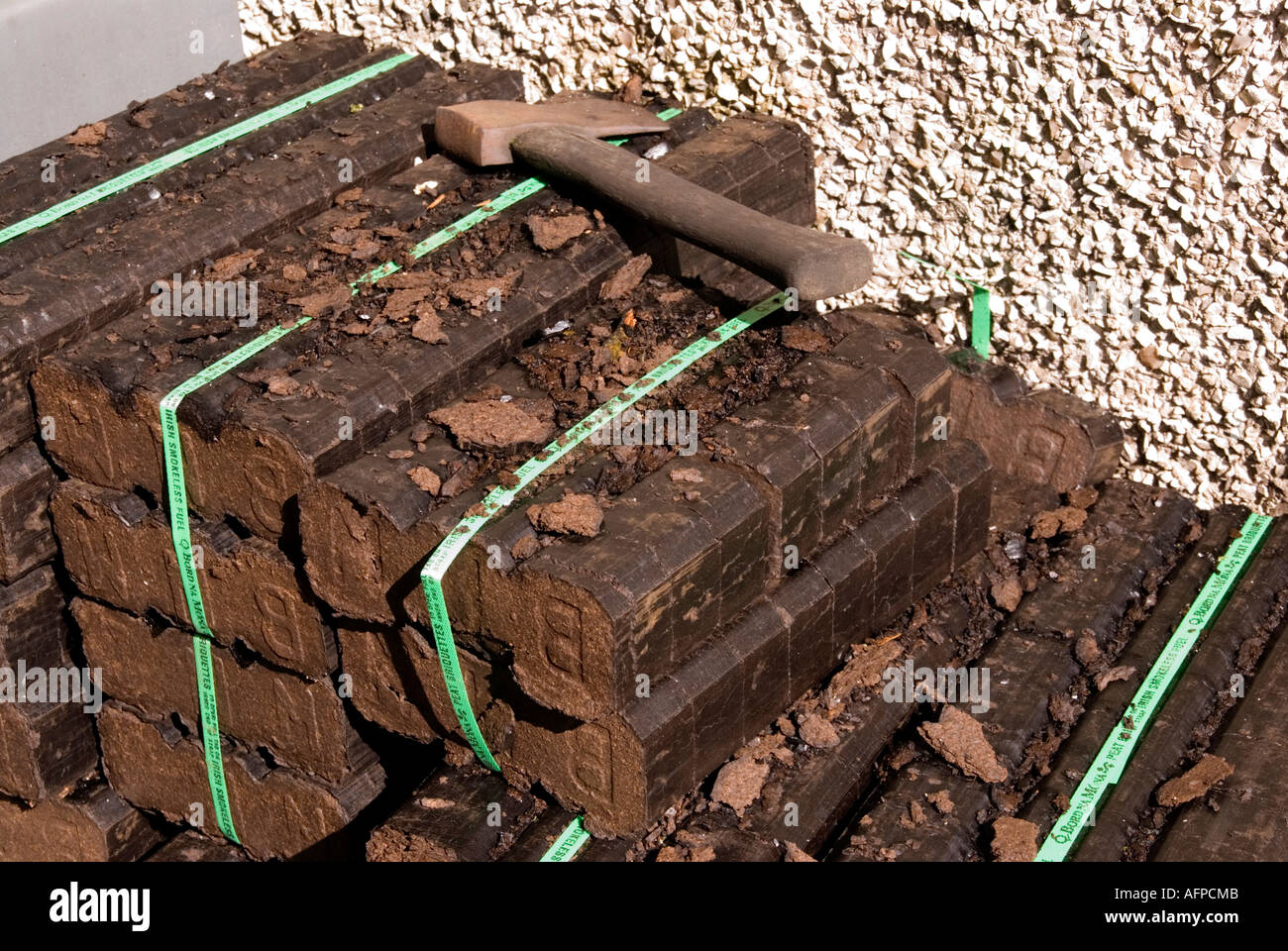 Peat blocks ready for the fire in Broughshane County Antrim Stock Photo