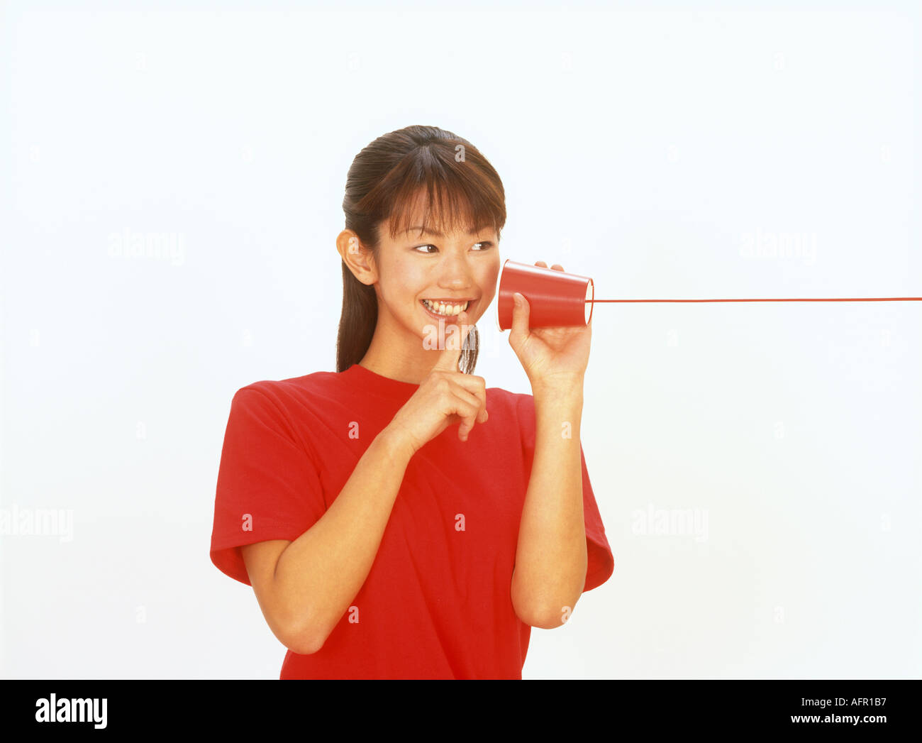 Japanese Woman Talking on String Telephone Stock Photo Alamy