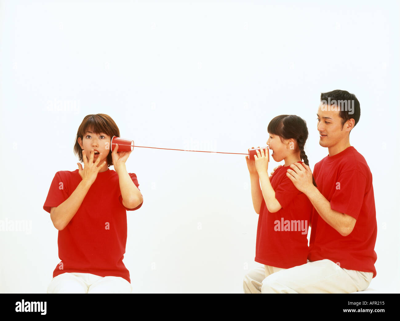 Family on String Telephone Stock Photo Alamy
