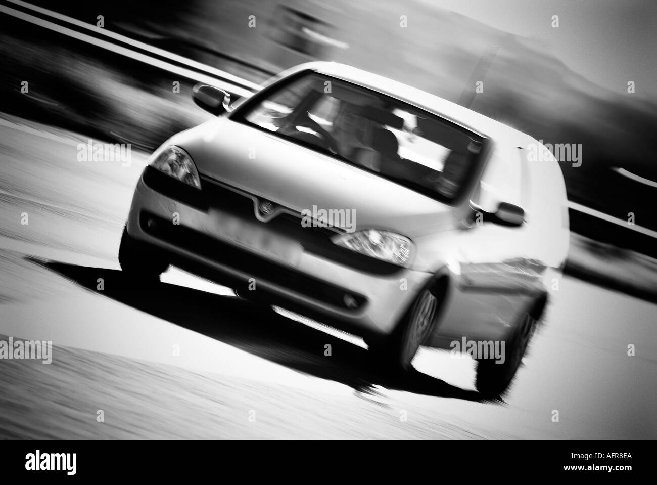 vauxhall corsa car at speed on motorway freeway general motors GM city car small ditance travel first 1st Stock Photo