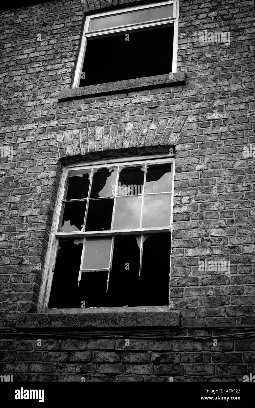 disused building industrial closed down run broken glass factory mill