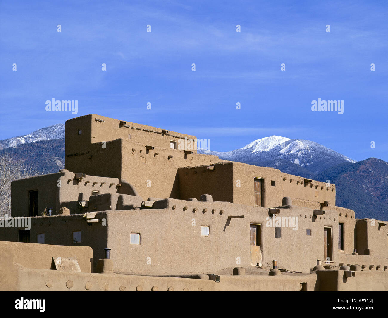 The Tiwa pueblo Taos located in Taos New Mexico at the base of the Sangre de Cristo Mountains Stock Photo