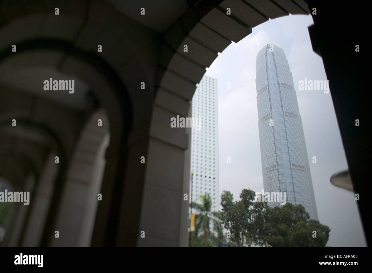 Hong Kong s international finance centre building pictured through the ledgco builiding  Stock Photo