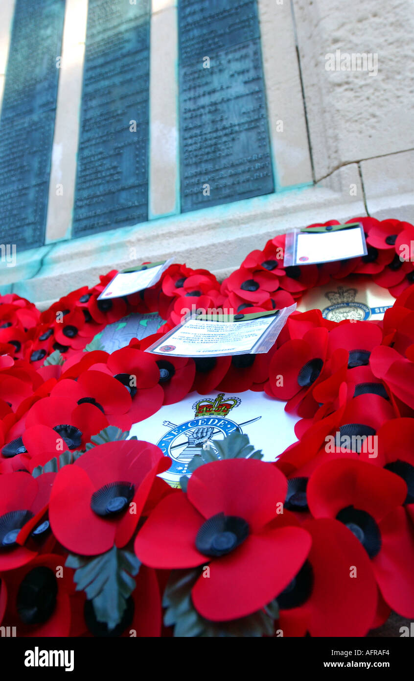 Close up of Poppy wreaths at a cenotaph during a Remembrance Service Stock Photo