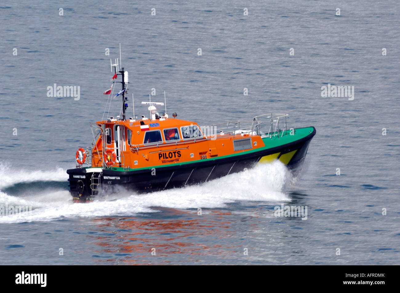 a pilots boat launch speeding through the waves sea operated by ...