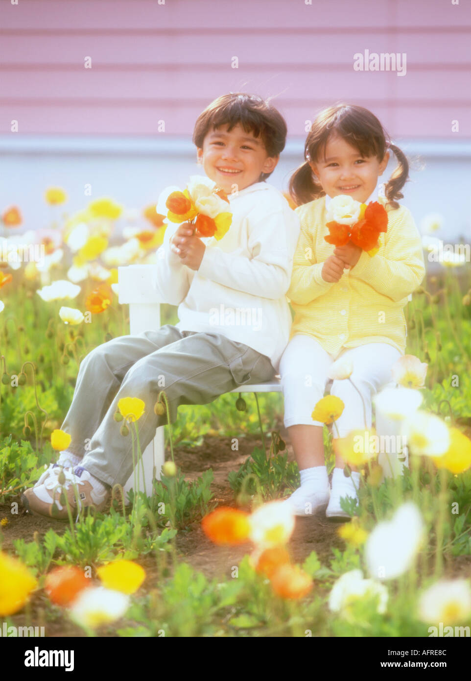 Kids flower field hi-res stock photography and images - Alamy