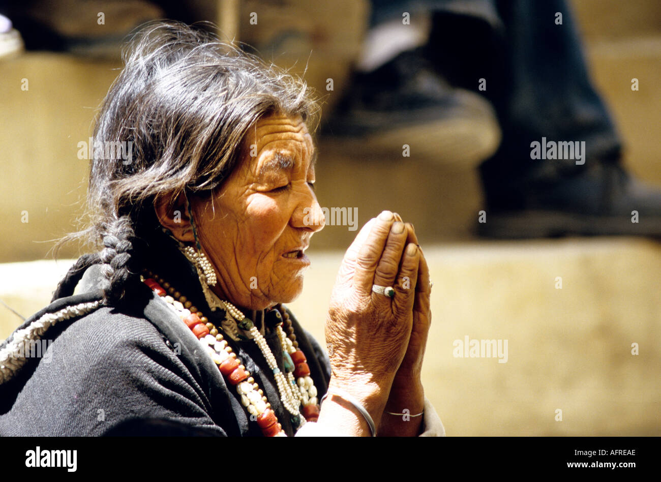 Woman praying Tak Tok Festival Ladakh India Stock Photo