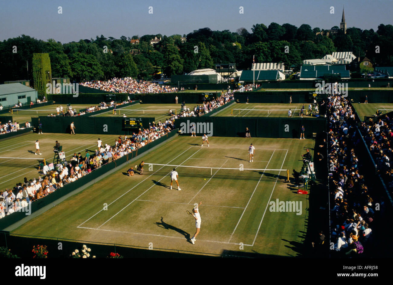 Wimbledon tennis 1980s, outside courts view towards Wimbledon village St Mary's Church London SW19 1985 HOMER SYKES Stock Photo