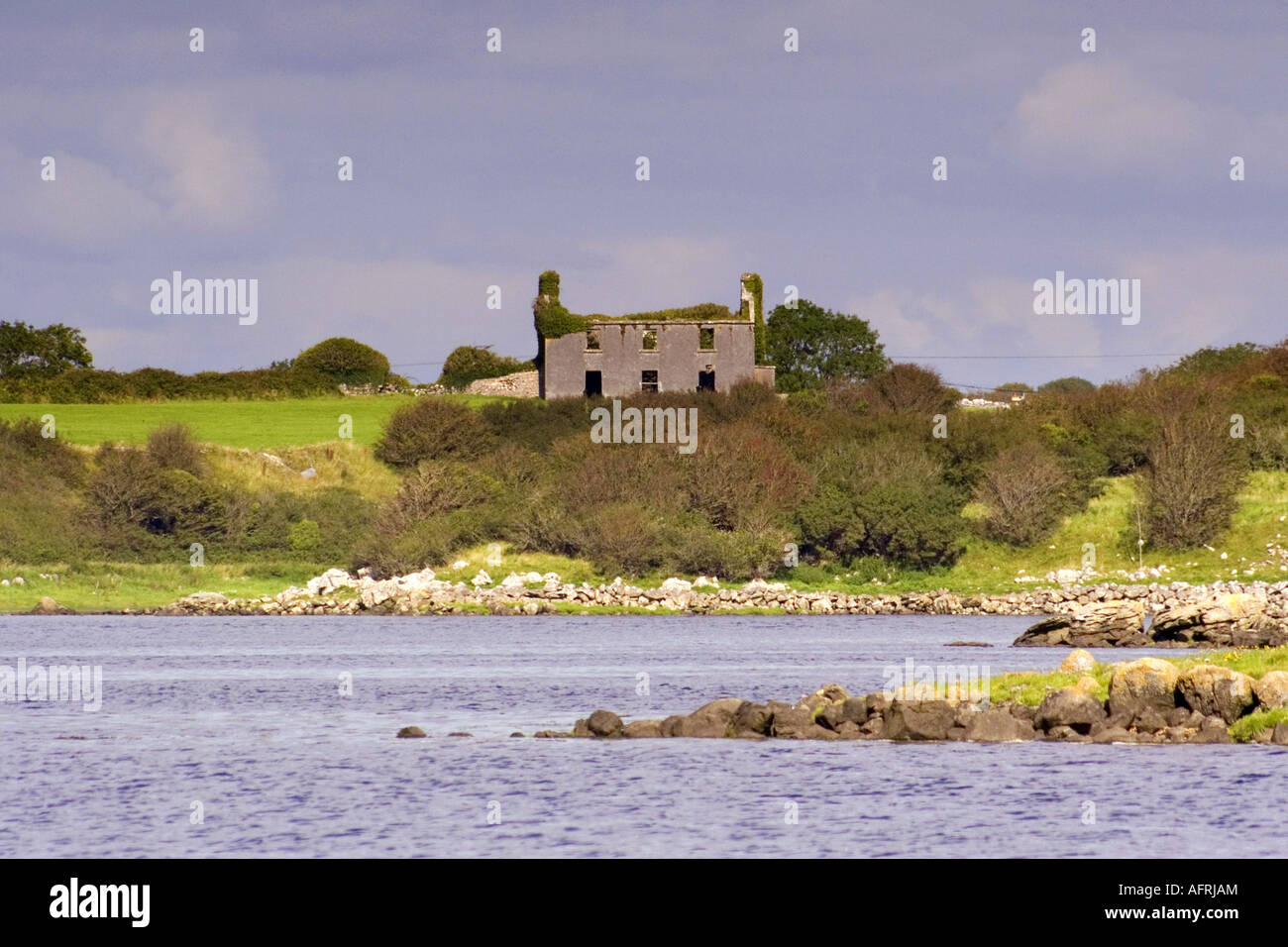 Ruined and delapidated house at Kinvarra Bay County Clare Ireland Stock