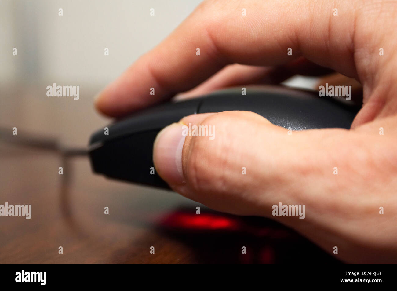 A close up view of a hand using a computer mouse Stock Photo - Alamy