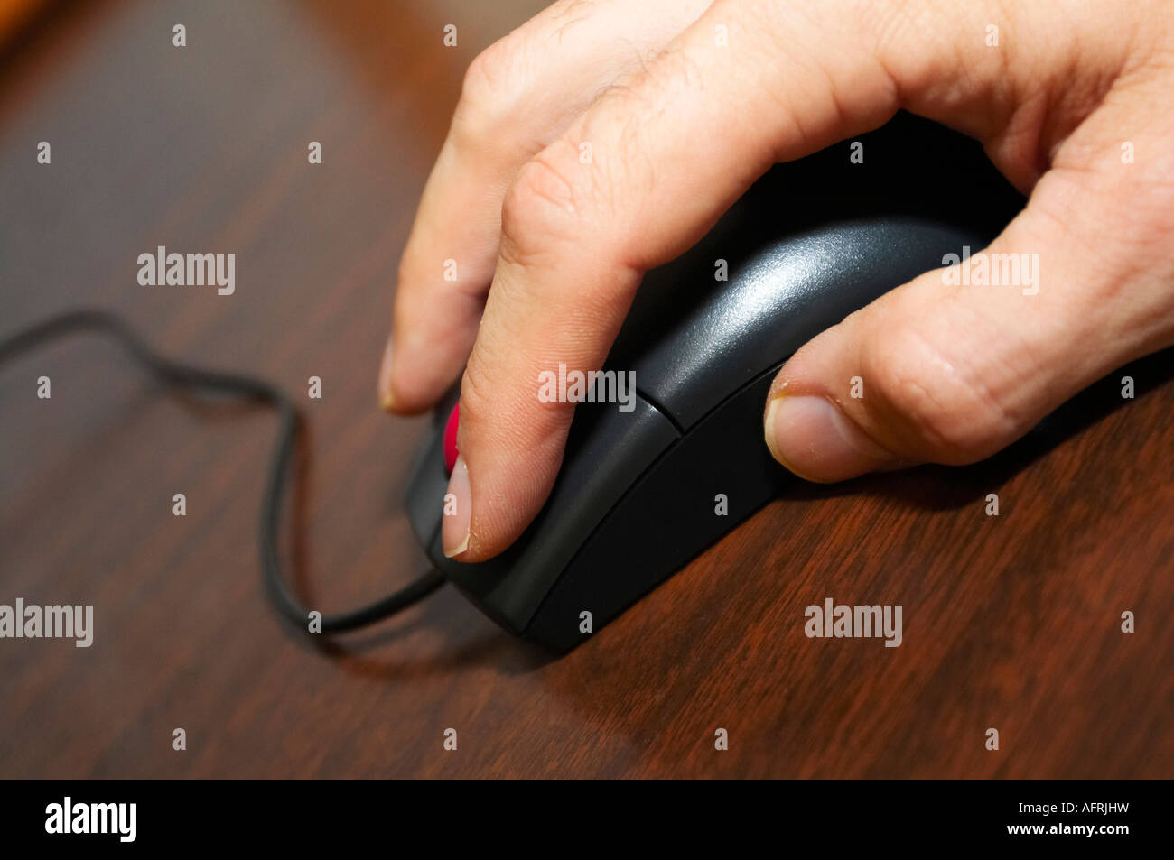 A close up view of a hand using a computer mouse Stock Photo - Alamy