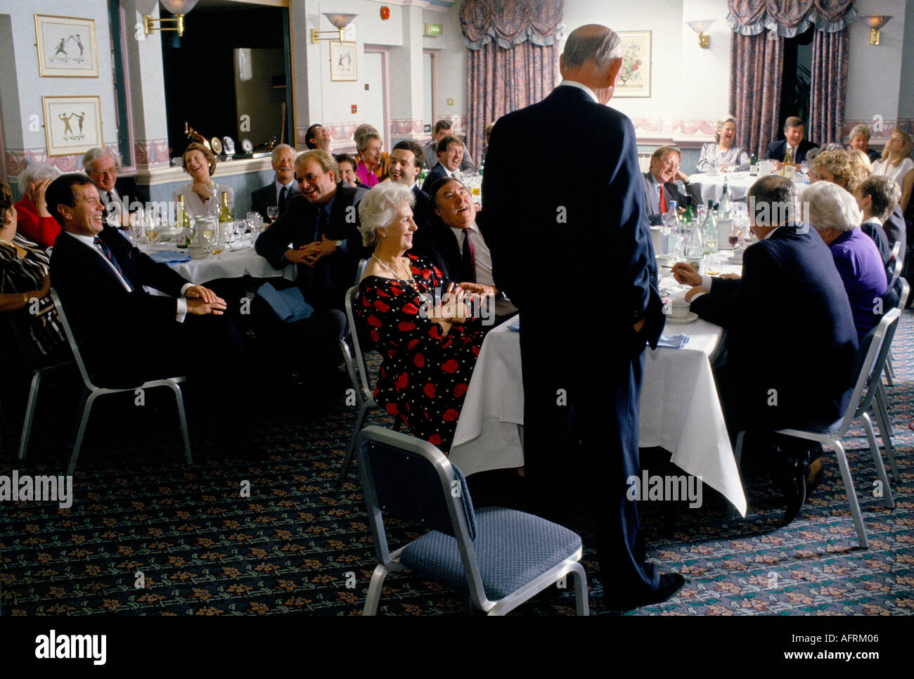 Brian Johnston After Dinner Speaker, cricketer speaking engagement audience of business people. 1990s UK 1992 George Hotel Gloucester Gloucestershire Stock Photo