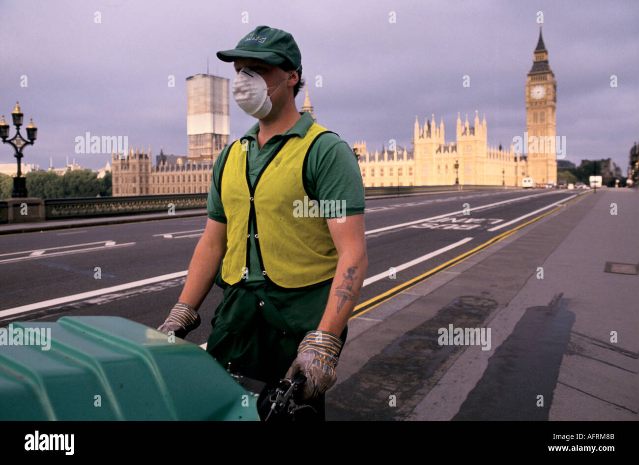 Street cleaner Low Paid work worker UK  'House of Parliament'  London Big Ben England 'Westminster bridge'  HOMER SYKES Stock Photo