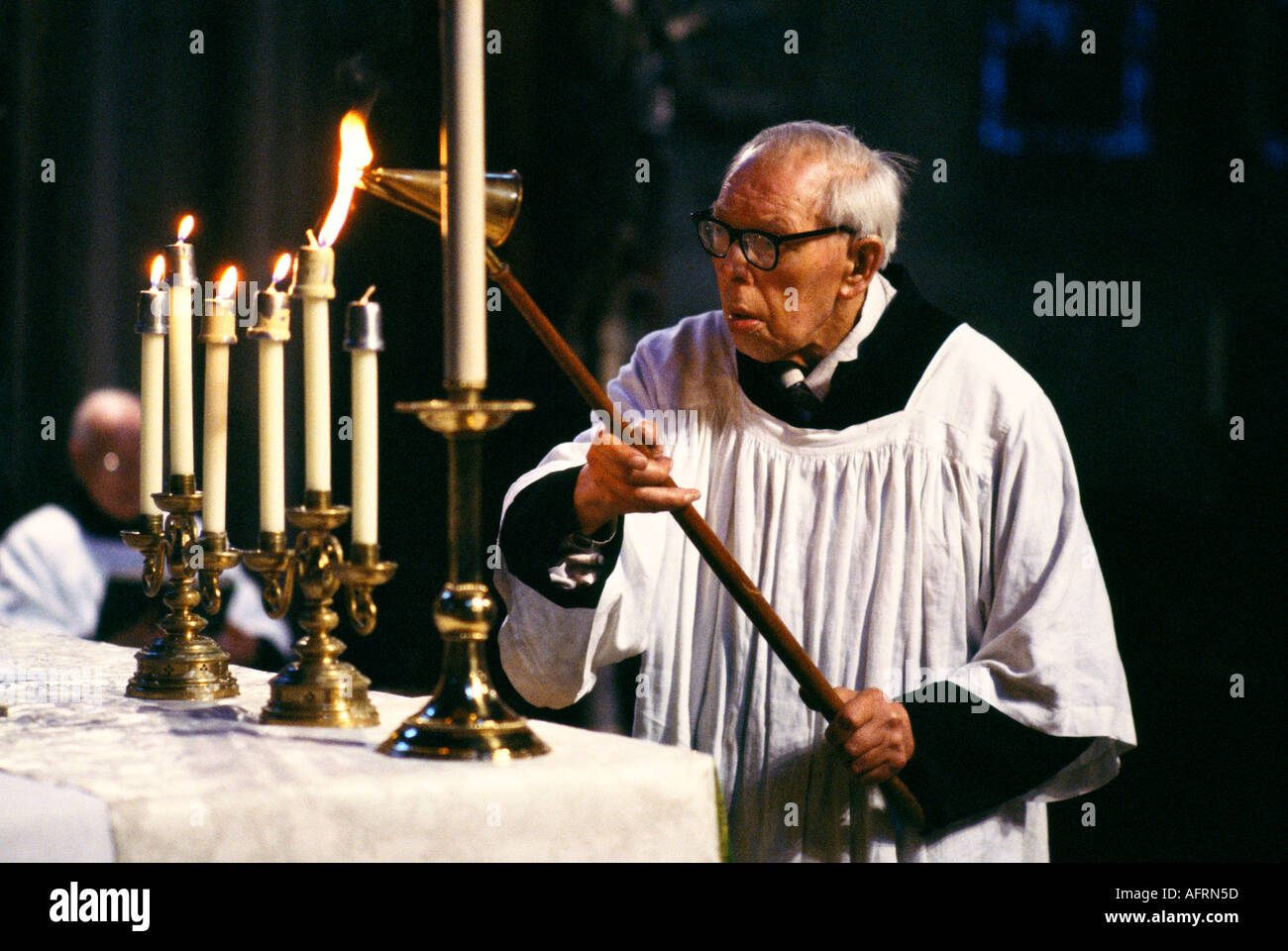 LIGHTING CANDLES FOR EVENING PRAYERS AT ST JOHN THE BAPTISTS CHURCH