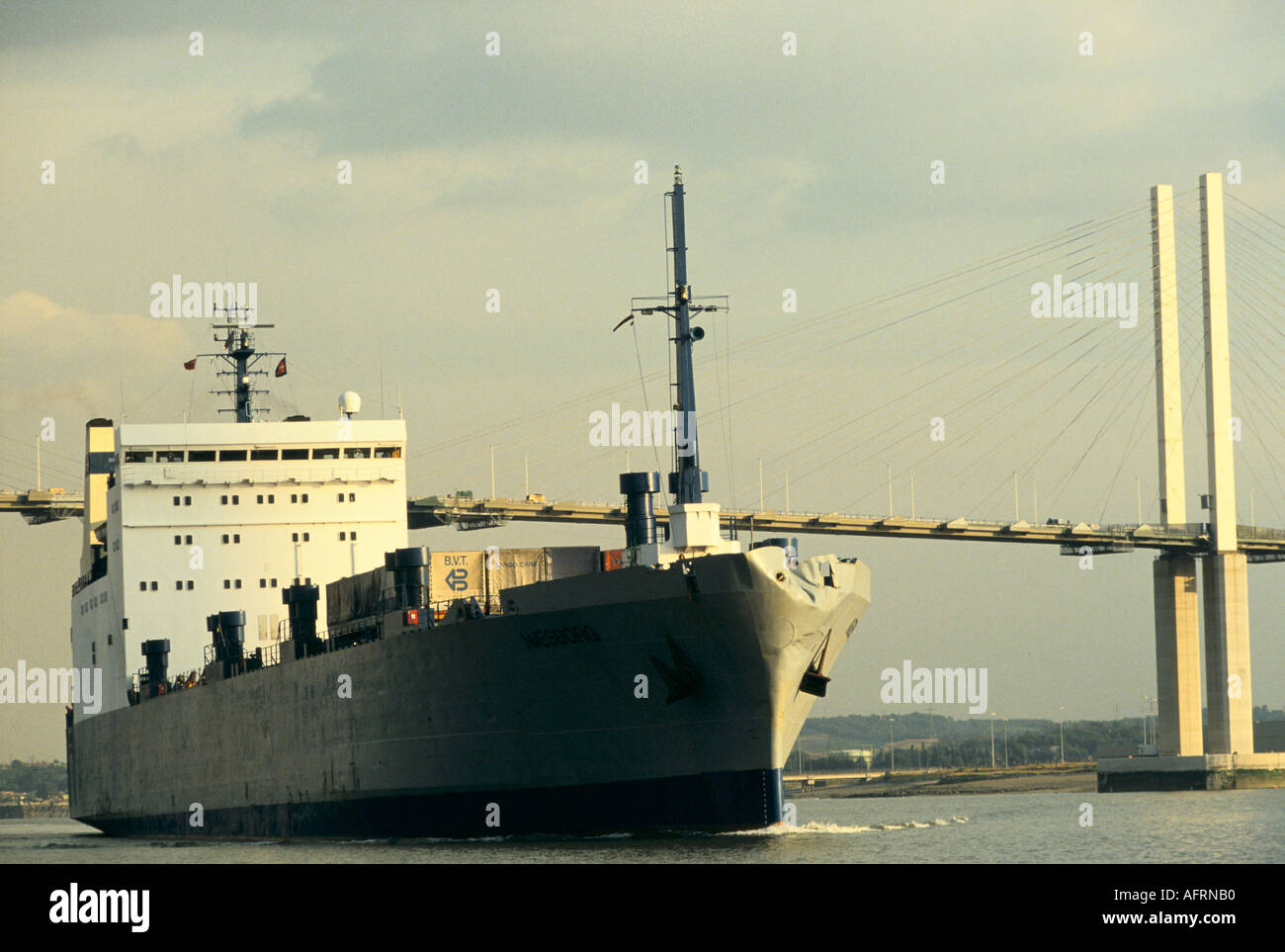 Roll On Roll Off Ferry cargo from Zeebrugge, Belgium to Purfleet Essex. Cargo ship coming up River Thames to Purfleet. Dartford Bridge. 1990s 1991 UK Stock Photo