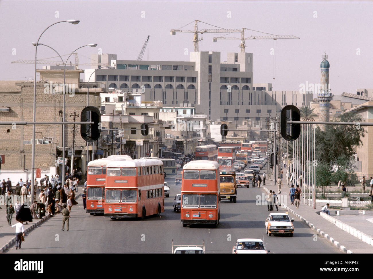 Iraq 1980s, Saddam City Baghdad.  English British Leyland buses traffic daily life 1984 HOMER SYKES Stock Photo