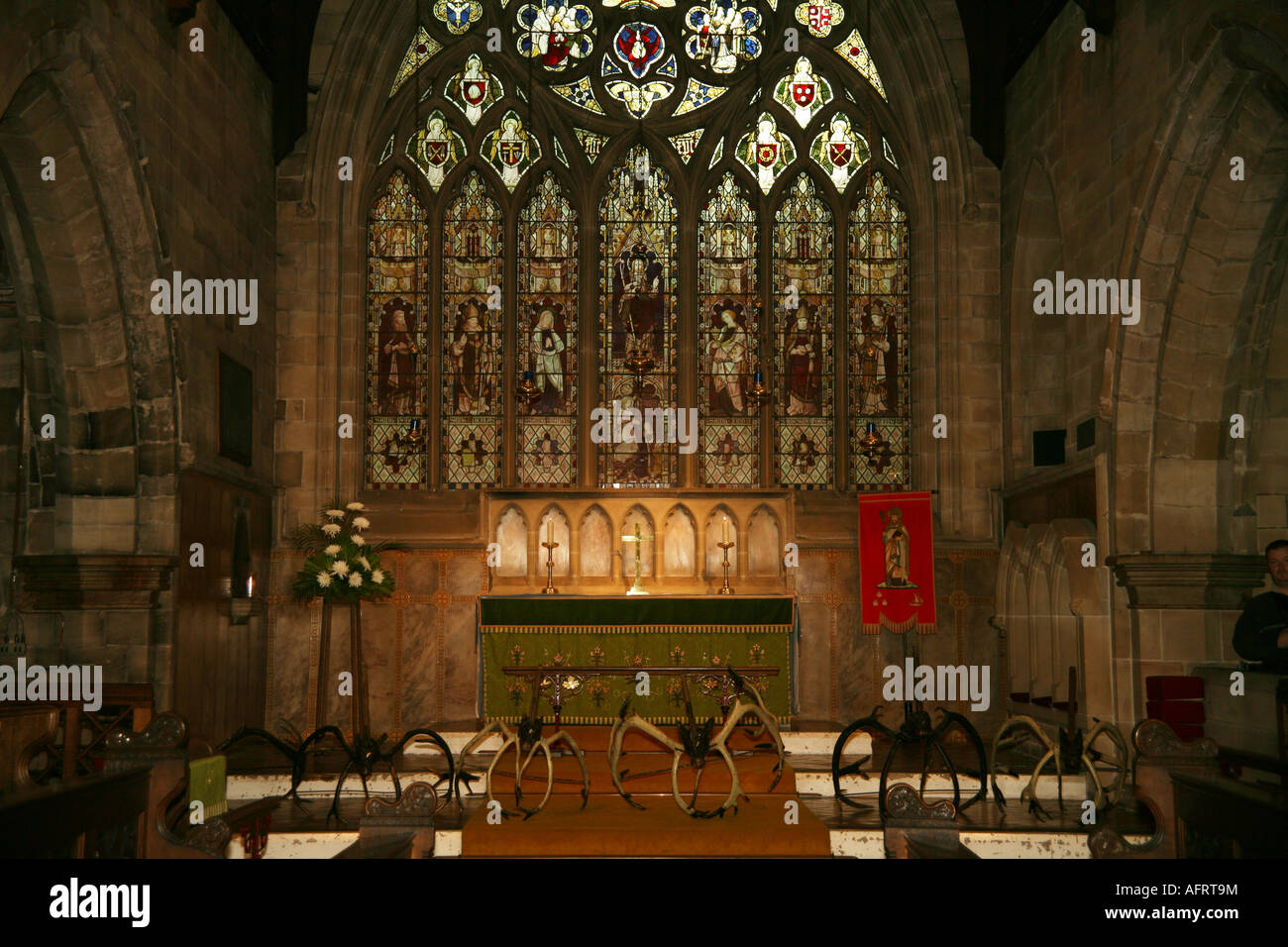 St Nicholas' Church, with the antlers in the foreground before the Horn Dance Abbot’s Bromley Staffordshire UK. Stock Photo