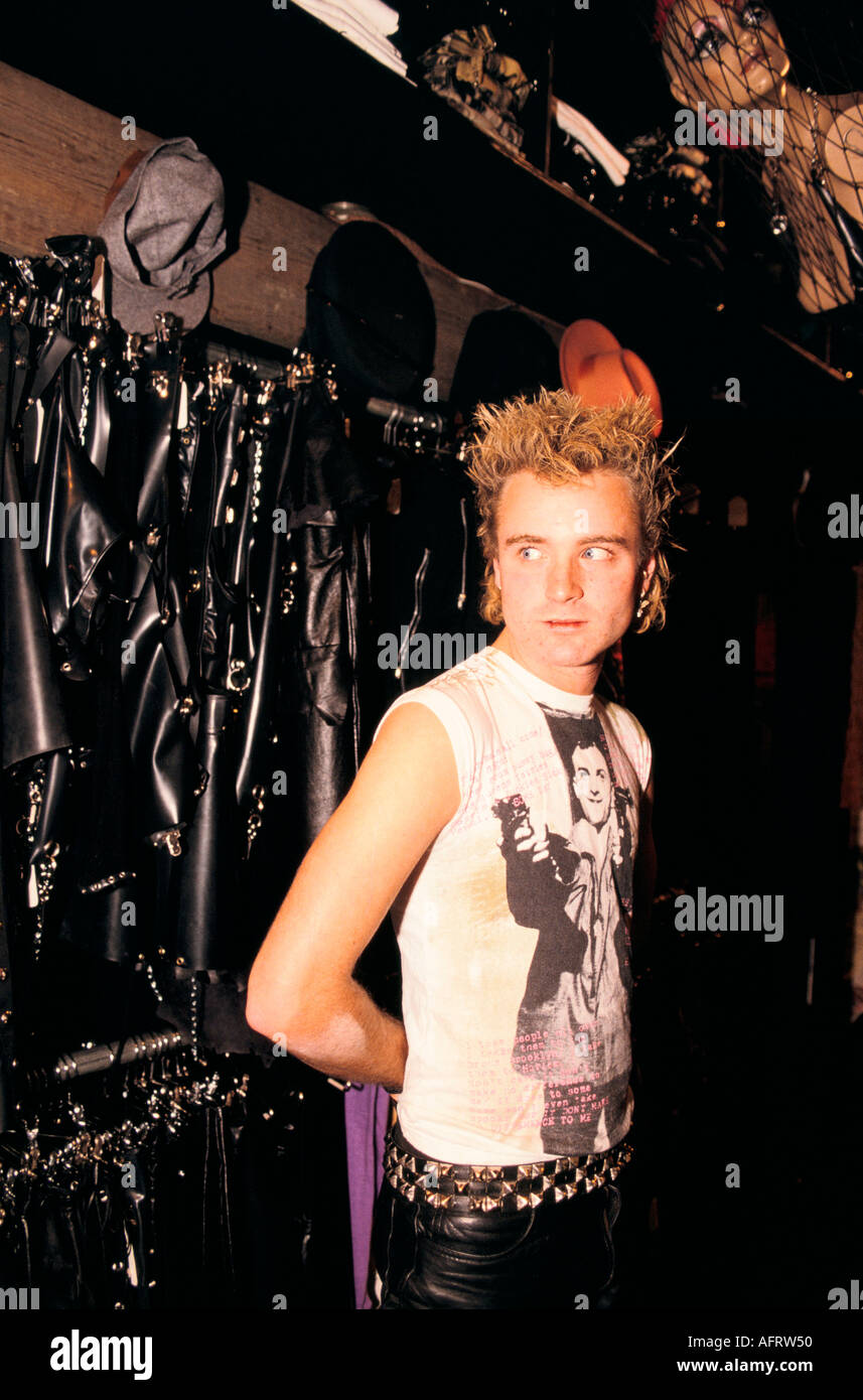 Punk man in a Kings Road Chelsea clothing store, The Great Gear Market a punk fashion clothes store. London England UK. 1980s 1983 HOMER SYKES Stock Photo