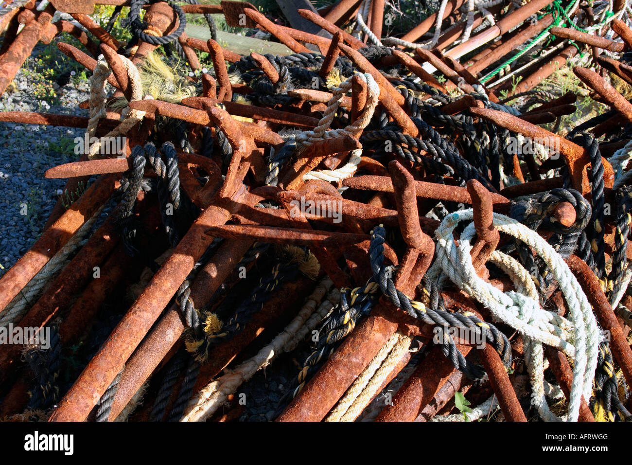 several rusted anchors at Peggy`s Cove, Atlantic Canada. Photo by Willy ...