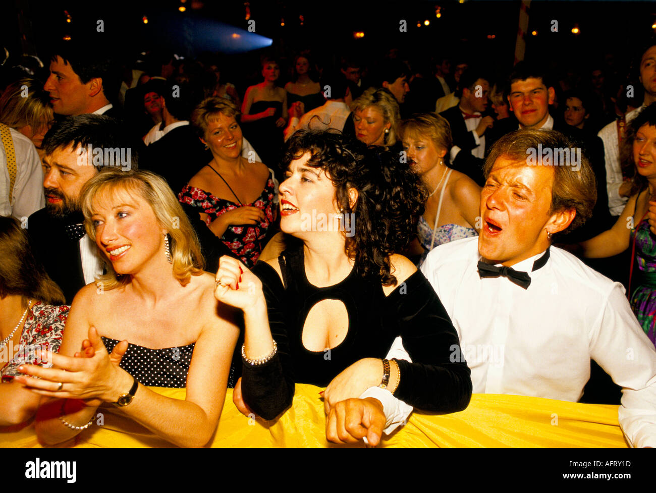 Keyhole dress fashion 1990s Royal Agricultural College University End of year nightclub dance live rock band performing Cirencester Gloucestershire UK Stock Photo