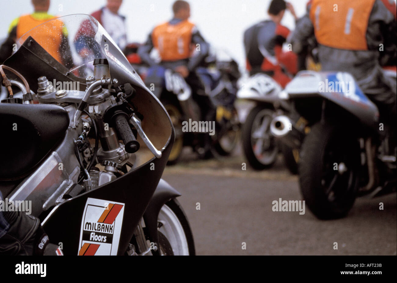 Portrait of 125CC race bike waiting to race Keevil Airfield Wiltshire England Summer 2004 Stock Photo