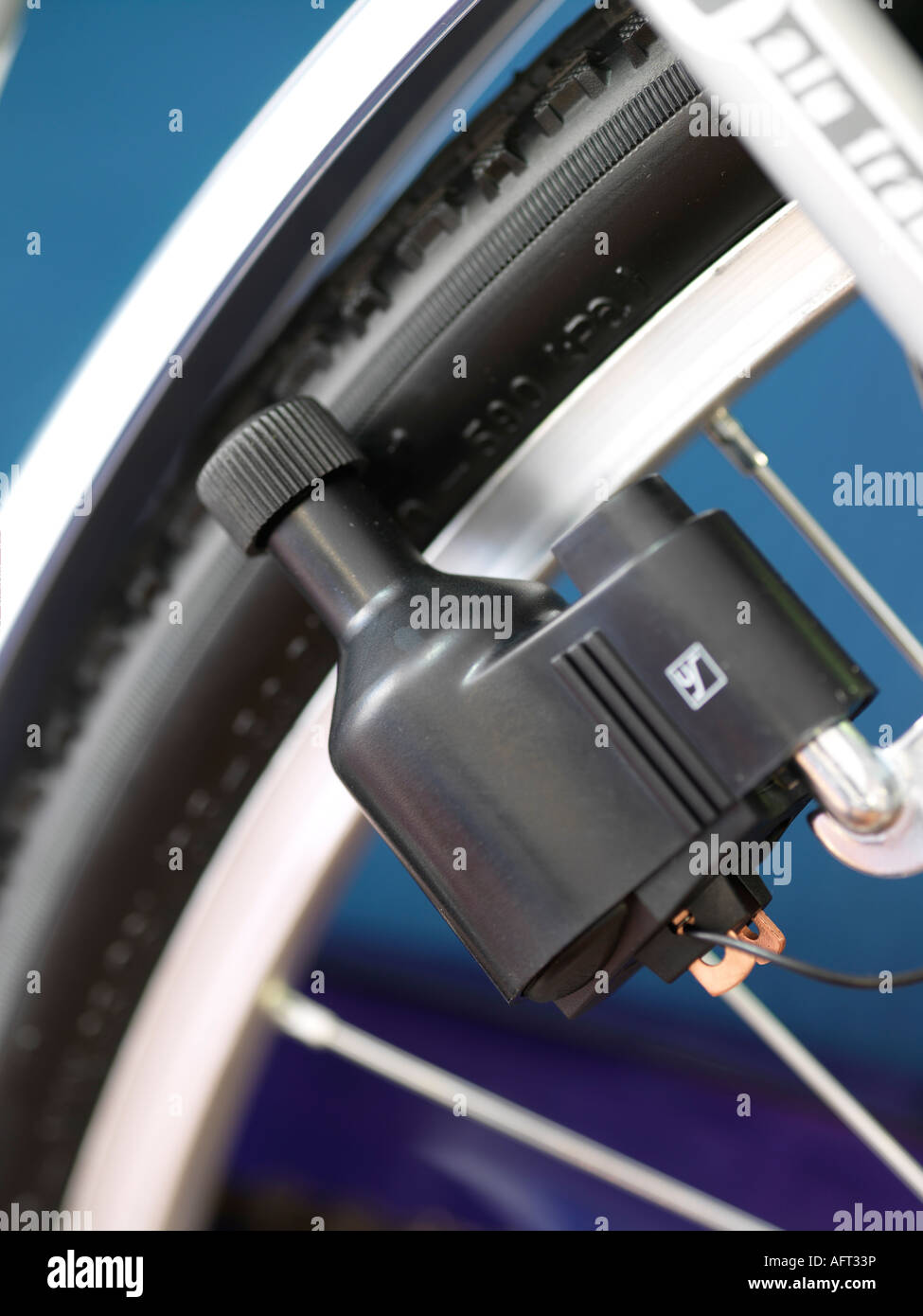 bicycle bike wheel detail vertical dynamo energy light Stock Photo