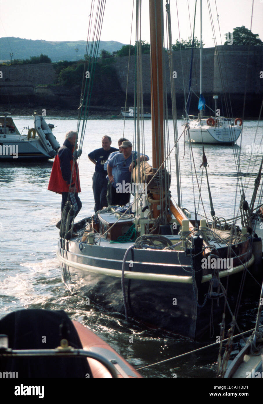 Crew of Laura preparing for another Nobby race at Conwy River Festival 2004 Stock Photo
