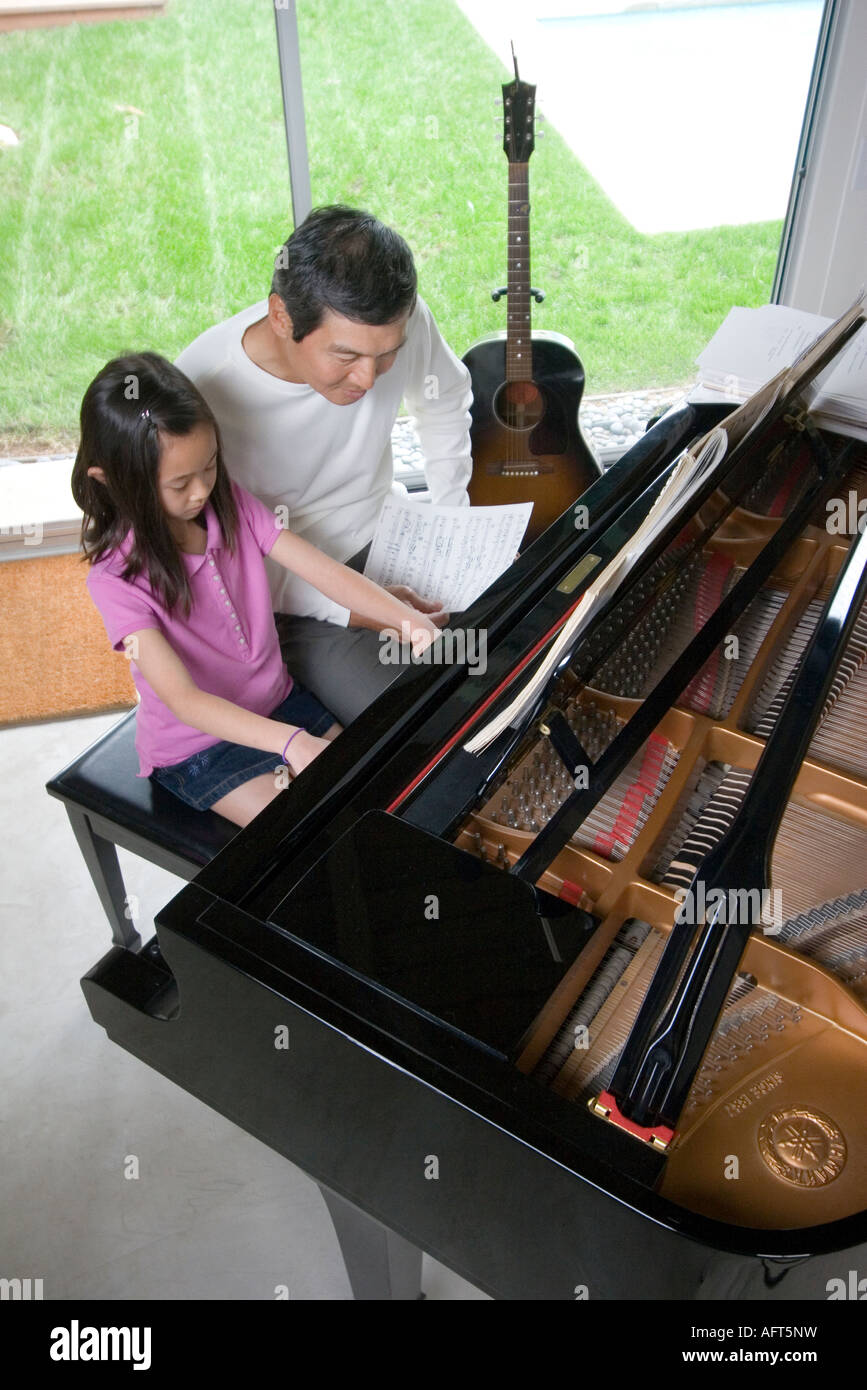 Young Girl Taking Piano Lesson Stock Photo Alamy