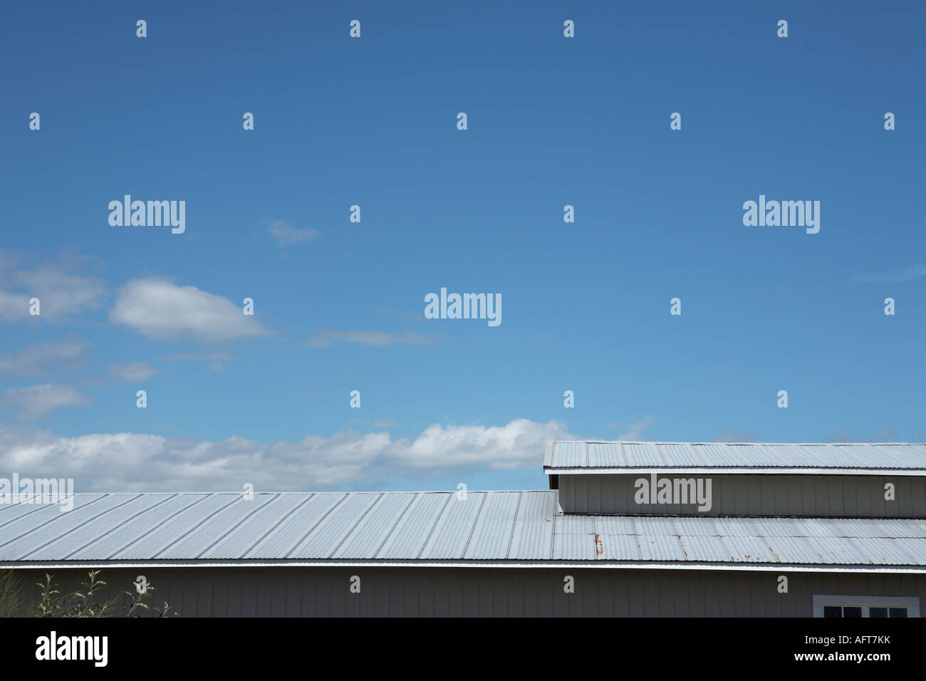 Barn Roof with Blue Sky and Clouds Stock Photo - Alamy