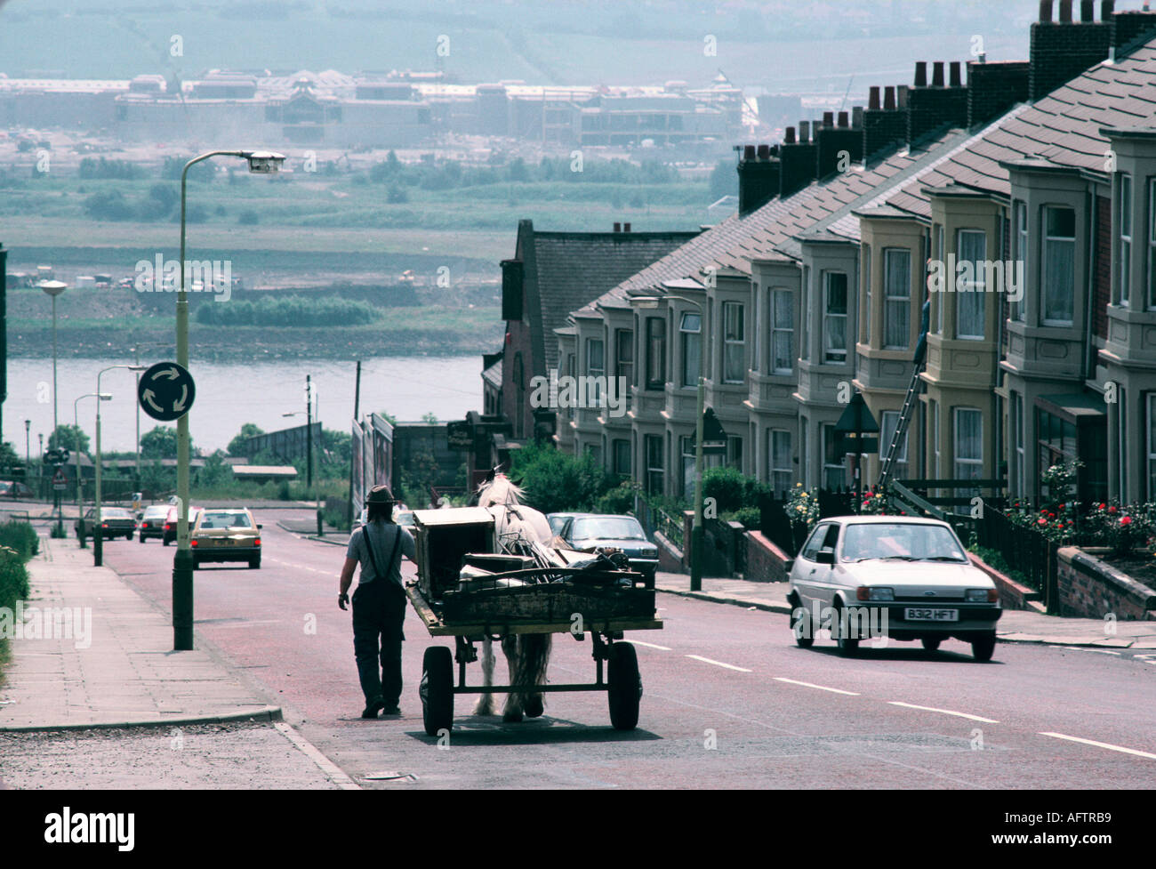 Rag and Bone man with horse and cart collecting scrap for recycling Merseyside near Liverpool Lancashire 1990s UK HOMER SYKES Stock Photo