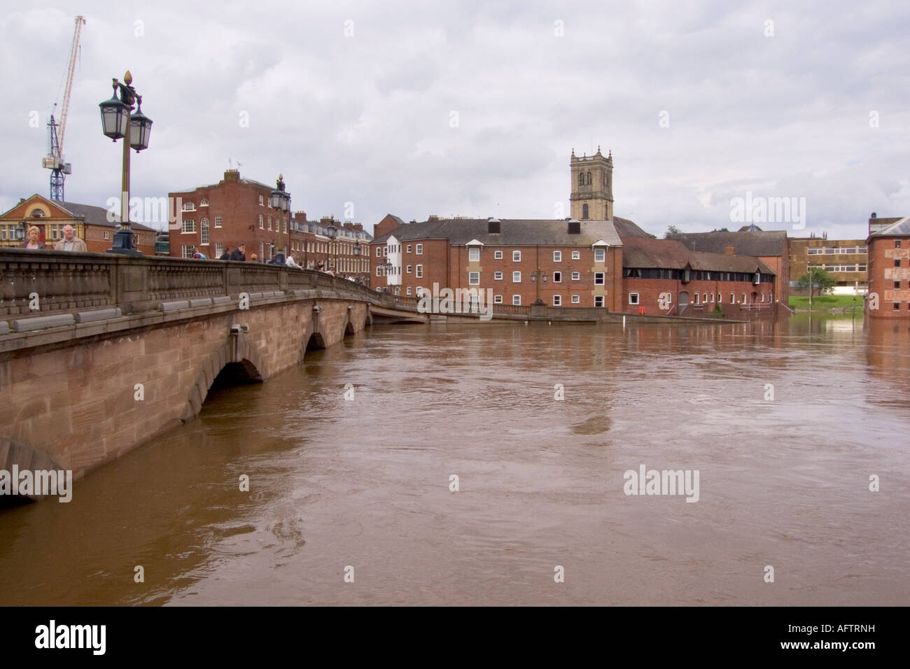 Jully 2007 flooding onlookers, River Severn, Worcester, Worcestershire, England, UK, Europe Stock Photo