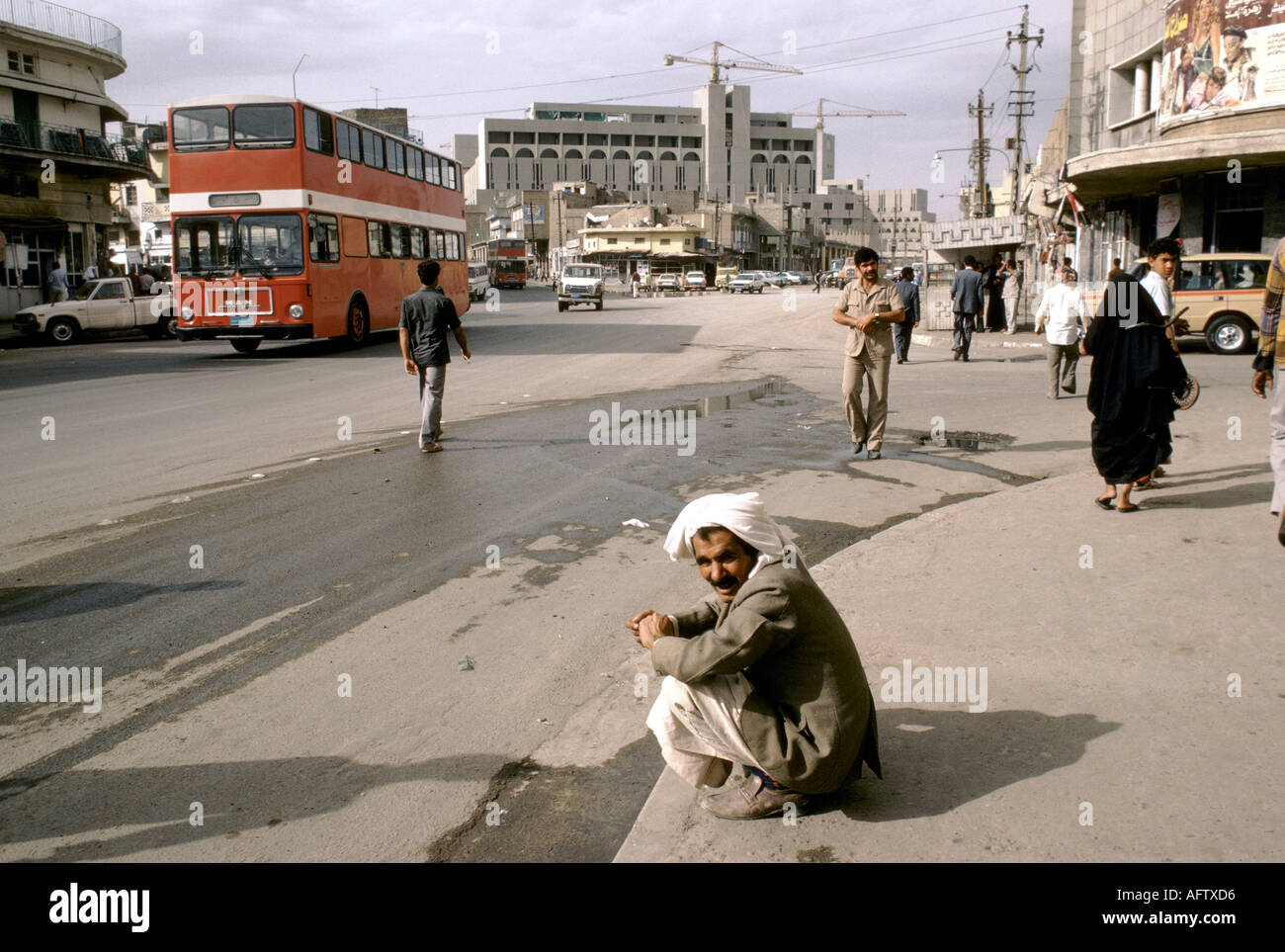 Iraq 1980s, Saddam City Baghdad. English British Leyland buses traffic daily life 1984 HOMER SYKES Stock Photo