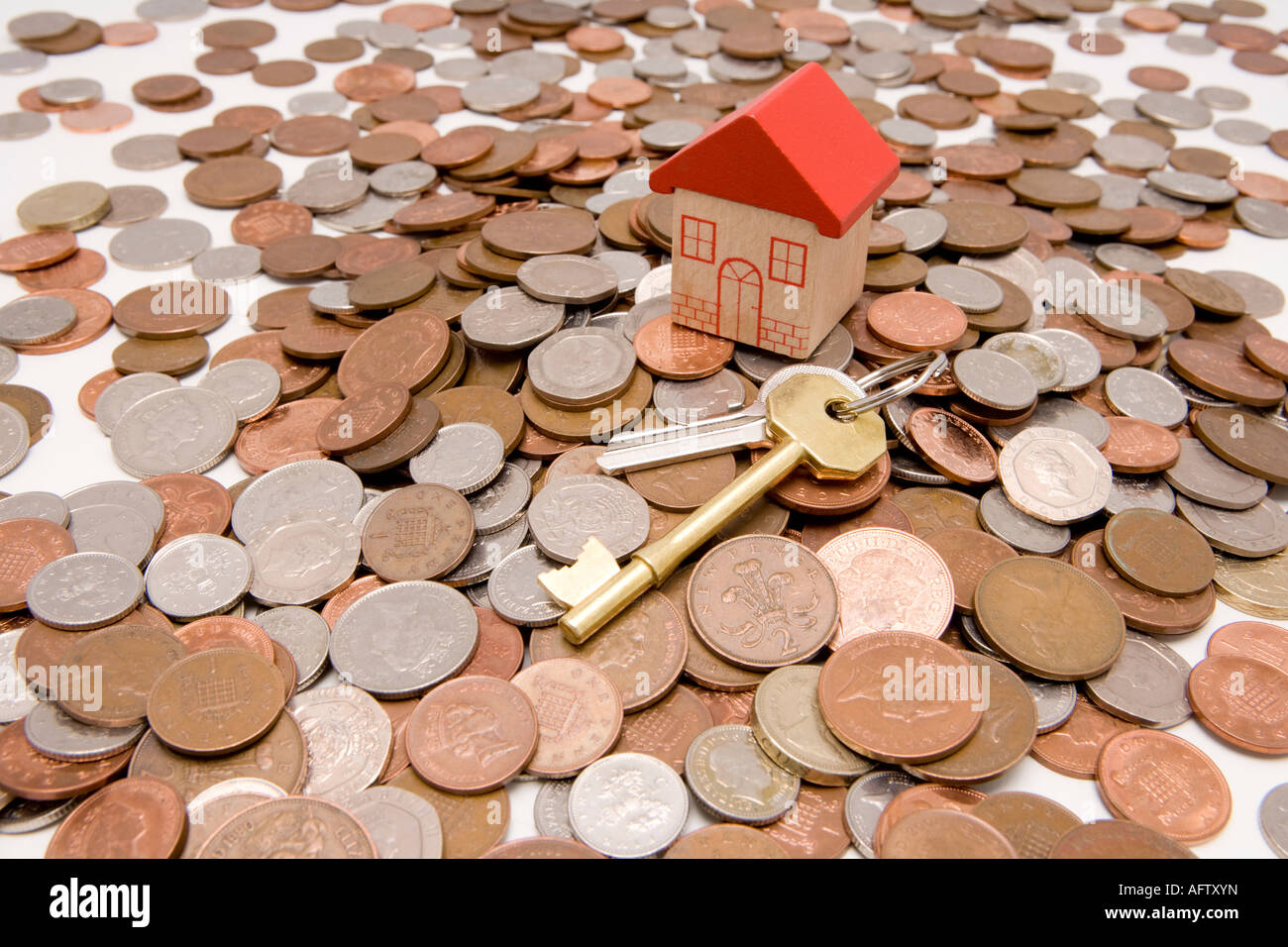 Savings invested in a new home or property keys to new house or home Stock Photo