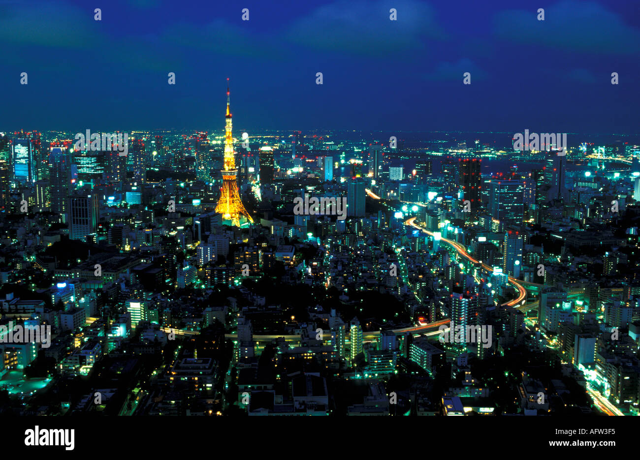 Illuminated Tokyo Tower soaring above Tokyo at night Tokyo City View ...