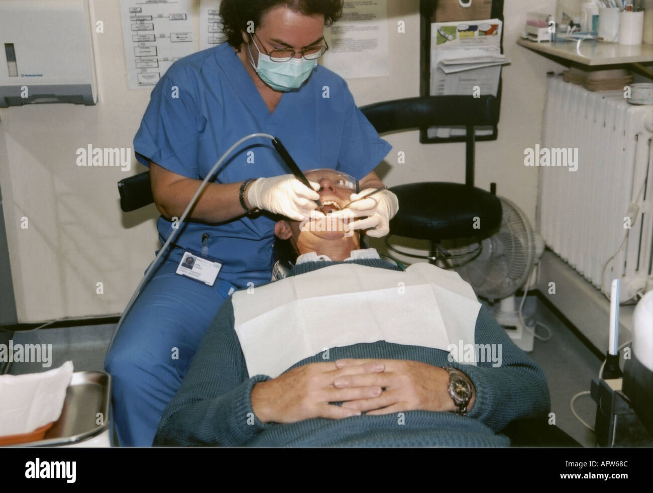 Dentistry dentist and patient Drilling inspection Stock Photo