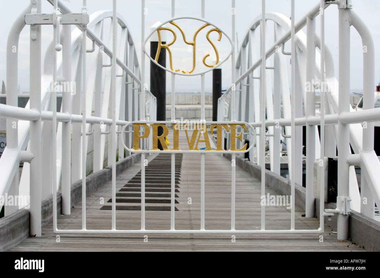 gates onto pontoon jetty at the royal yacht squadron in cowes on the isle of wight Stock Photo
