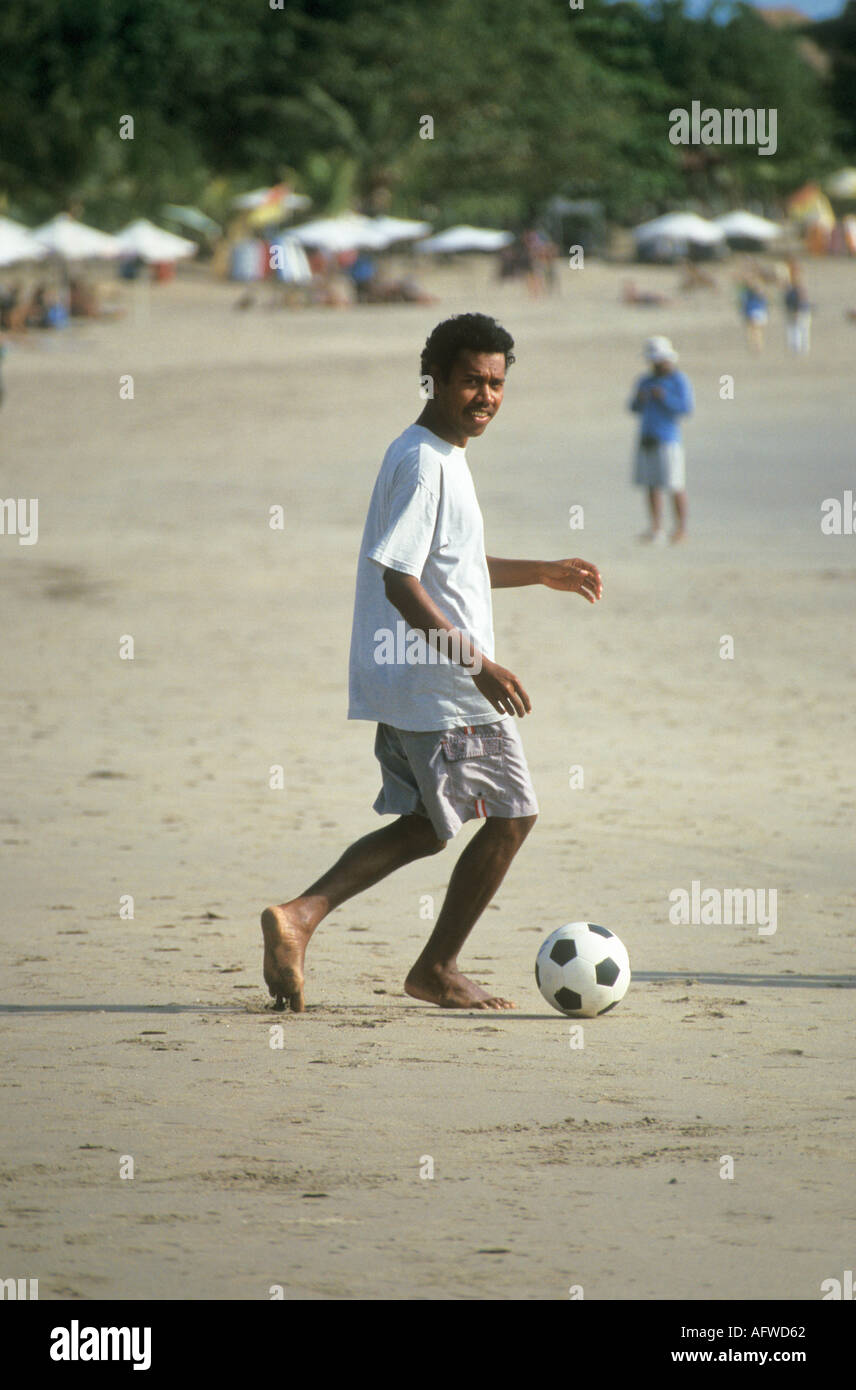 Man Playing Soccer On Beach Kuta Bali Indonesia Stock Photo Alamy