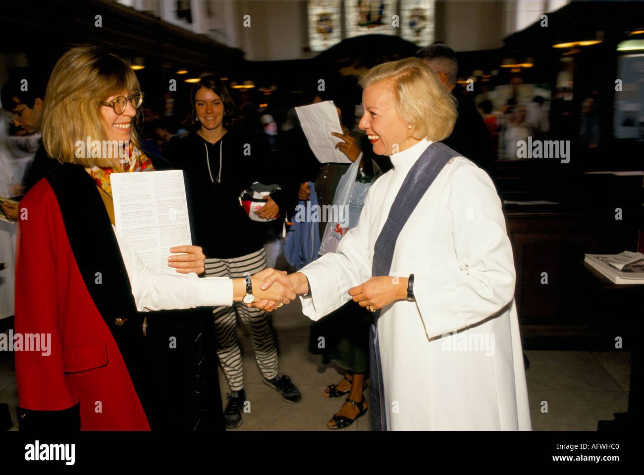 Revd Ulla Monberg, at St James Piccadilly, London June 1992. Meeting members of the church community at  the end of the Sunday morning church service. Stock Photo