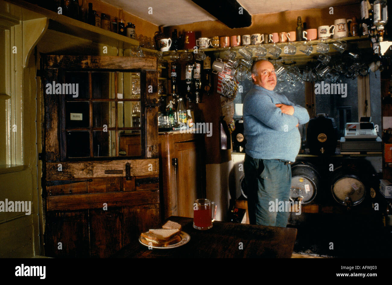 The Tuckers Grave pub, Faulkland Somerset, West Country, Publican pint of beer and sandwich. Brew their own beer.1990s 1992  UK England HOMER SYKES Stock Photo